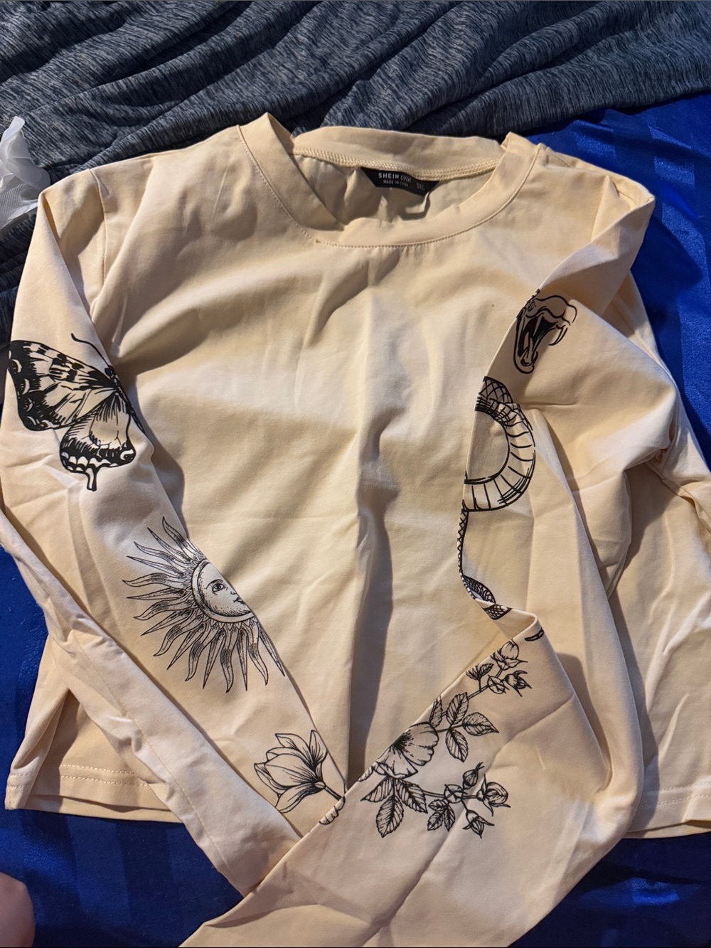 SHEIN Beige Long Sleeve Graphic Tee with Black Illustrations